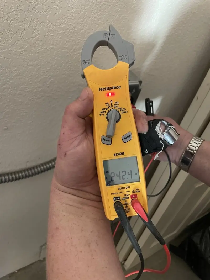 Voltage testing with clamp meter during Hot Tub / Pool Electrical Wiring in Franklin